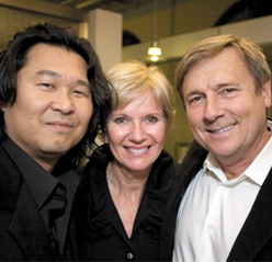Atlanta architect Young Pak (left) celebrates the grand opening of Beacham & Company's new office with founder Glennis Beacham and Landscape architect Rick Anderson. Pak lauded Beaham for creating a space that is 