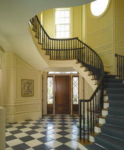According to the owner, the beauty  of the home is that it has all the amenities of new construction but with the look and feel of an older house. The traditional spiral staircase in the entry foyer offers an excellent example.